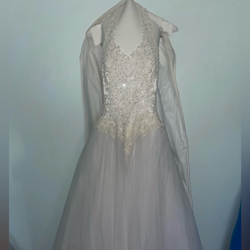 White halter wedding gown with pearls and clear beading design